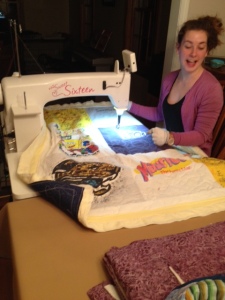 Sarah quilting a t-shirt quilt with blanket edging